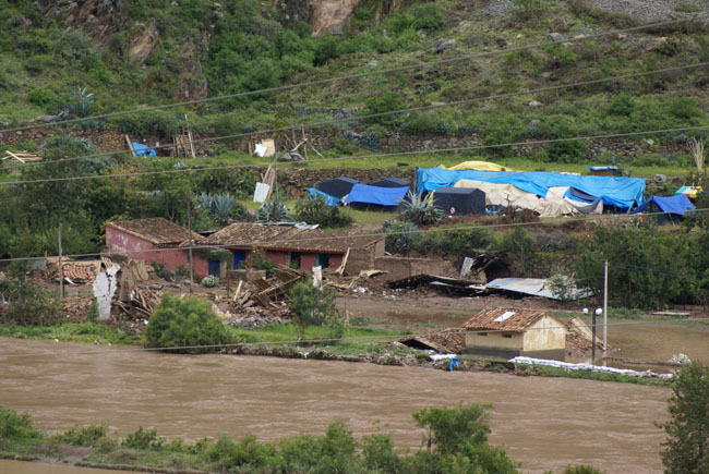 Homes washed away by the river