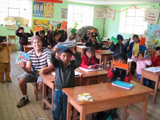 Washi and the kids in school in Peruvian village